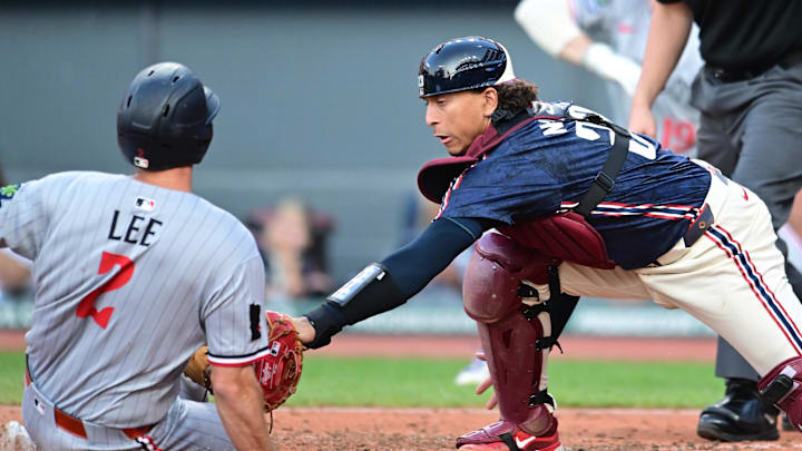 Aug 1, 2025; Cleveland, Ohio, USA; Cleveland Guardians catcher Bo Naylor (23) tags out Minnesota Twins shortstop Brooks Lee (2) during the third inning at Progressive Field. Mandatory Credit: Ken Blaze-Imagn Images Aug 1, 2025; Cleveland, Ohio, USA; Cleveland Guardians catcher Bo Naylor (23) tags out Minnesota Twins shortstop Brooks Lee (2) during the third inning at Progressive Field. Mandatory Credit: Ken Blaze-Imagn Images