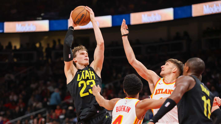 Feb 27, 2024; Atlanta, Georgia, USA; Utah Jazz forward Lauri Markkanen (23) grabs a rebound against the Atlanta Hawks in the second half at State Farm Arena. Mandatory Credit: Brett Davis-USA TODAY Sports