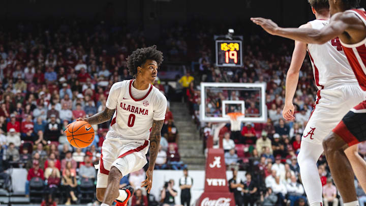 Jan 4, 2025; Tuscaloosa, Alabama, USA; Alabama Crimson Tide guard Labaron Philon (0) drives the ball against the Oklahoma Sooners during the second half at Coleman Coliseum. Mandatory Credit: Will McLelland-Imagn Images