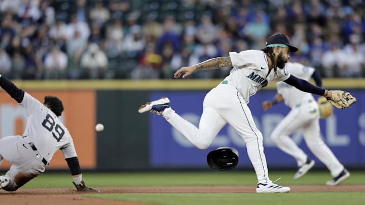 Seattle Mariners shortstop J.P. Crawford (3) cannot catch the throw as New York Yankees center fielder Jasson Domínguez (89) steals second during the second inning at T-Mobile Park on Sept 18.
