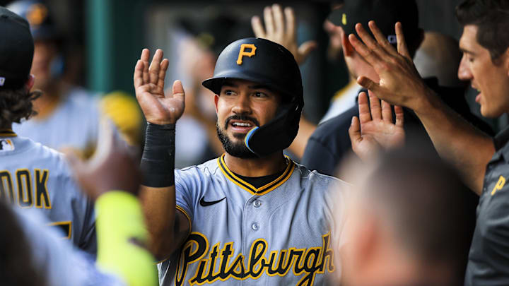Mar 31, 2026; Cincinnati, Ohio, USA; Pittsburgh Pirates shortstop Nick Gonzales (3) high fives teammates after scoring on a sacrifice fly out hit by third baseman Nick Yorke (not pictured) in the second inning against the Cincinnati Reds at Great American Ball Park. Mandatory Credit: Katie Stratman-Imagn Images