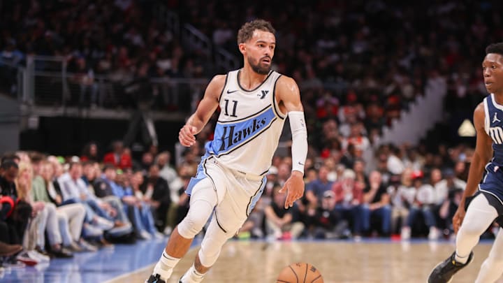 Nov 25, 2024; Atlanta, Georgia, USA; Atlanta Hawks guard Trae Young (11) dribbles against the Dallas Mavericks in the third quarter at State Farm Arena. Mandatory Credit: Brett Davis-Imagn Images Nov 25, 2024; Atlanta, Georgia, USA; Atlanta Hawks guard Trae Young (11) dribbles against the Dallas Mavericks in the third quarter at State Farm Arena. Mandatory Credit: Brett Davis-Imagn Images