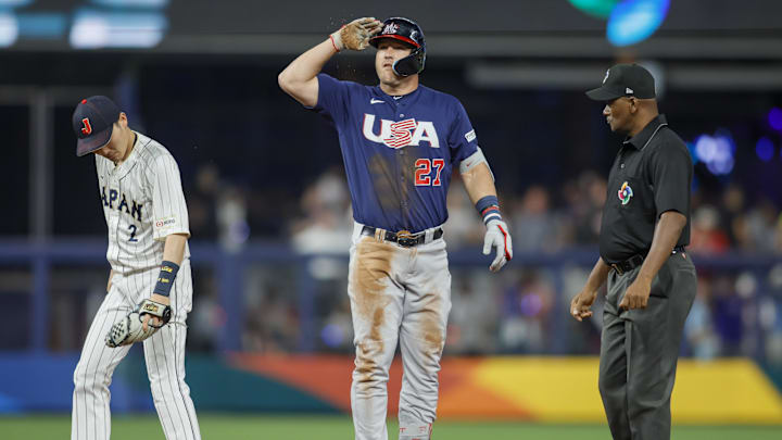 Mar 21, 2023; Miami, Florida, USA; USA center fielder Mike Trout (27) reacts from second base after hitting a double during the first inning against Japan at LoanDepot Park. Mandatory Credit: Sam Navarro-Imagn Images