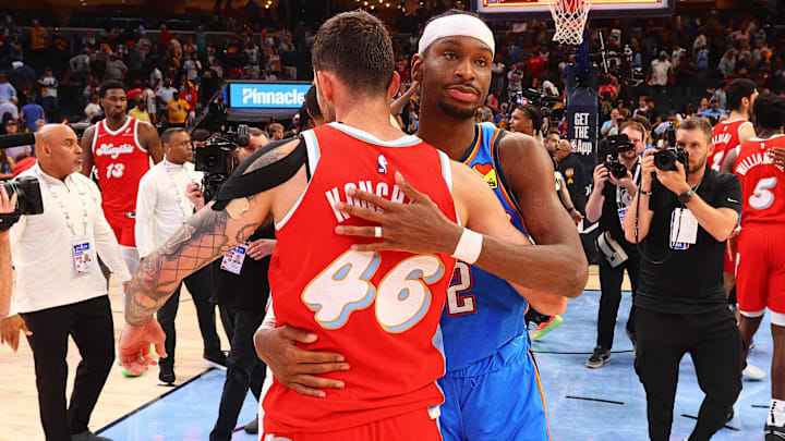 Apr 26, 2025; Memphis, Tennessee, USA; Oklahoma City Thunder guard Shai Gilgeous-Alexander (2) embraces with Memphis Grizzlies guard John Konchar (46) after game four for the first round of the 2024 NBA Playoffs at FedExForum. Mandatory Credit: Petre Thomas-Imagn Images
