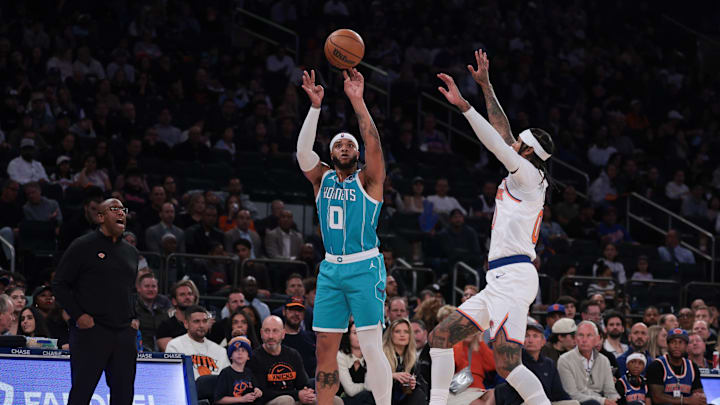 Oct 17, 2025; New York, New York, USA; Charlotte Hornets forward Miles Bridges (0) shoots the ball as New York Knicks guard Jordan Clarkson (00) defends during the first half at Madison Square Garden. Mandatory Credit: Vincent Carchietta-Imagn Images Oct 17, 2025; New York, New York, USA; Charlotte Hornets forward Miles Bridges (0) shoots the ball as New York Knicks guard Jordan Clarkson (00) defends during the first half at Madison Square Garden. Mandatory Credit: Vincent Carchietta-Imagn Images