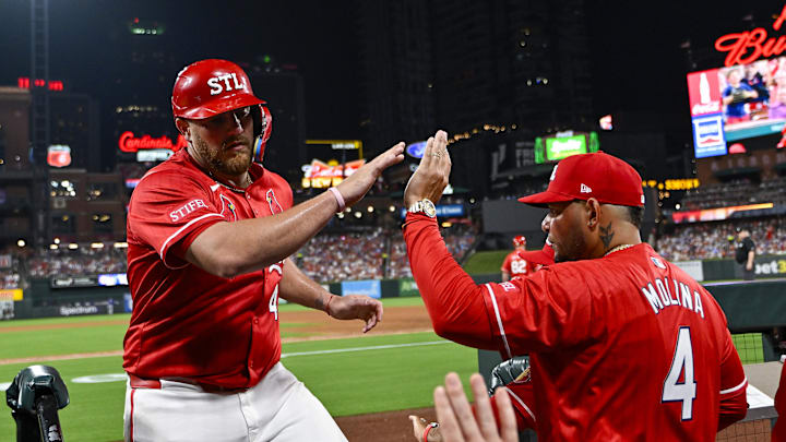 Aug 8, 2025; St. Louis, Missouri, USA; St. Louis Cardinals catcher Pedro Pages (43) is congratulated by guest coach Yadier Molina (4) after scoring against the Chicago Cubs during the fifth inning at Busch Stadium. Mandatory Credit: Jeff Curry-Imagn Images Aug 8, 2025; St. Louis, Missouri, USA; St. Louis Cardinals catcher Pedro Pages (43) is congratulated by guest coach Yadier Molina (4) after scoring against the Chicago Cubs during the fifth inning at Busch Stadium. Mandatory Credit: Jeff Curry-Imagn Images