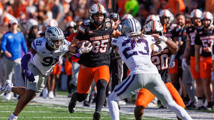 Nov 15, 2025; Stillwater, Oklahoma, USA; Oklahoma State Cowboys tight end Grayson Brousseau (85) runs the ball during the second half against the Kansas State Wildcats at Boone Pickens Stadium. Mandatory Credit: William Purnell-Imagn Images Nov 15, 2025; Stillwater, Oklahoma, USA; Oklahoma State Cowboys tight end Grayson Brousseau (85) runs the ball during the second half against the Kansas State Wildcats at Boone Pickens Stadium. Mandatory Credit: William Purnell-Imagn Images