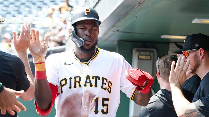 Sep 3, 2026; Pittsburgh, Pennsylvania, USA;  Pittsburgh Pirates center fielder Oneil Cruz (15) high-fives in the dugout after scoring a run against the San Francisco Giants during the sixth inning at PNC Park.  Mandatory Credit: Charles LeClaire-Imagn Images