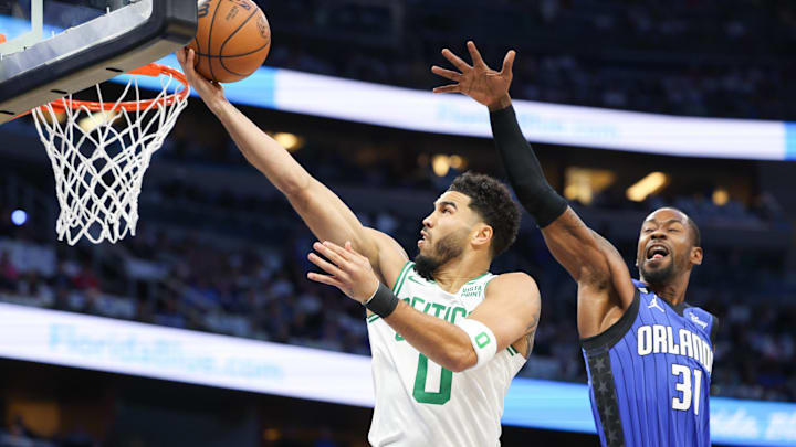 Oct 22, 2022; Orlando, Florida, USA;  Boston Celtics forward Jayson Tatum (0) shoots the ball over