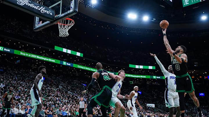 Apr 29, 2025; Boston, Massachusetts, USA; Boston Celtics forward Jayson Tatum (0) shoots the ball against Orlando Magic guard Kentavious Caldwell-Pope (3) in the third quarter during game five of first round for the 2025 NBA Playoffs at TD Garden. Mandatory Credit: David Butler II-Imagn Images Apr 29, 2025; Boston, Massachusetts, USA; Boston Celtics forward Jayson Tatum (0) shoots the ball against Orlando Magic guard Kentavious Caldwell-Pope (3) in the third quarter during game five of first round for the 2025 NBA Playoffs at TD Garden. Mandatory Credit: David Butler II-Imagn Images