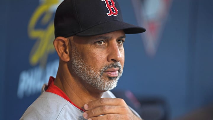 Jul 21, 2025; Philadelphia, Pennsylvania, USA; Boston Red Sox manager Alex Cora (13) in the dugout against the Philadelphia Phillies at Citizens Bank Park. Mandatory Credit: Eric Hartline-Imagn Images