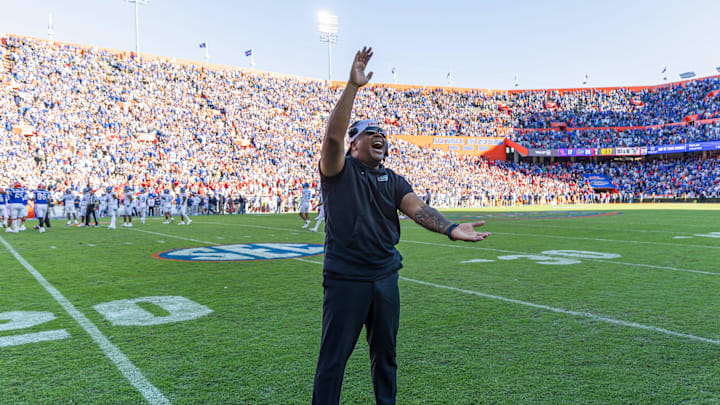 Nov 23, 2024; Gainesville, Florida, USA; Florida Gators associate head coach for running backs Jabbar Juluke celebrates after a game against the Mississippi Rebels at Ben Hill Griffin Stadium. Mandatory Credit: Matt Pendleton-Imagn Images