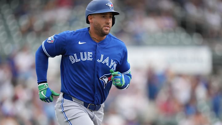Toronto Blue Jays designated hitter George Springer hits a home run.