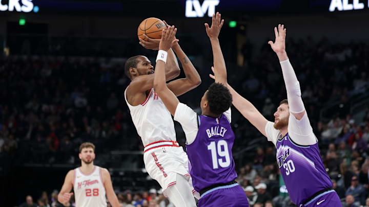 Dec 1, 2025; Salt Lake City, Utah, USA;  Houston Rockets forward Kevin Durant (7) shoots the ball past Utah Jazz guard Ace Bailey (19) during the second half at Delta Center. Mandatory Credit: Chris Nicoll-Imagn Images
