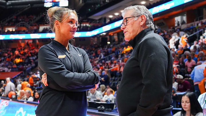 Tennessee head coach Kim Caldwell and UConn head coach Geno Auriemma have a lengthy chat before a women's college basketball game between the Lady Vols and UConn at Thompson-Boling Arena at Food City Center in Knoxville on Thursday, February 6, 2025. Tennessee head coach Kim Caldwell and UConn head coach Geno Auriemma have a lengthy chat before a women's college basketball game between the Lady Vols and UConn at Thompson-Boling Arena at Food City Center in Knoxville on Thursday, February 6, 2025.