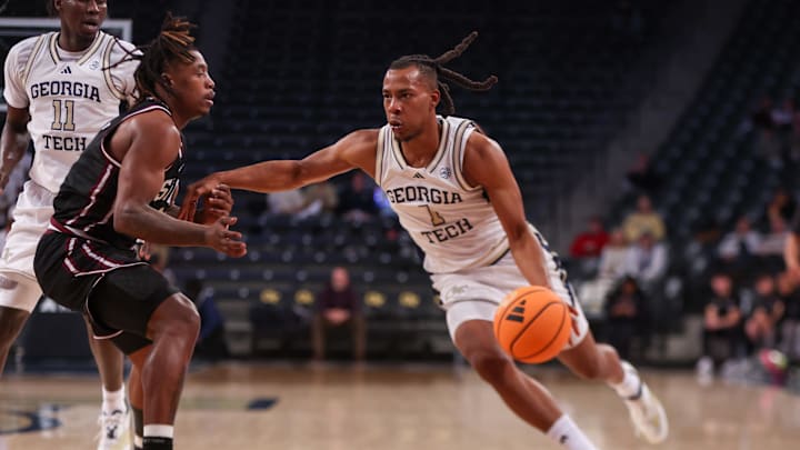 Dec 3, 2025; Atlanta, Georgia, USA; Georgia Tech Yellow Jackets guard Lamar Washington (1) drives to the basket against the Mississippi State Bulldogs in the second half at McCamish Pavilion. Mandatory Credit: Brett Davis-Imagn Images
Dec 3, 2025; Atlanta, Georgia, USA; Georgia Tech Yellow Jackets guard Lamar Washington (1) drives to the basket against the Mississippi State Bulldogs in the second half at McCamish Pavilion. Mandatory Credit: Brett Davis-Imagn Images
