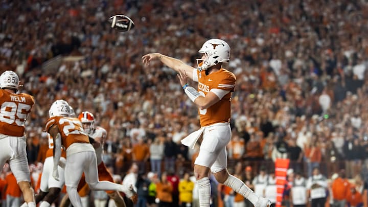 Dec 21, 2024; Austin, Texas, USA; Texas Longhorns quarterback Quinn Ewers (3) against the Clemson Tigers during the second half of the CFP National playoff first round at Darrell K Royal-Texas Memorial Stadium. Mandatory Credit: Mark J. Rebilas-Imagn Imagesmagn Images