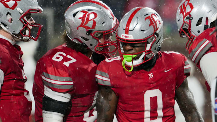 Teammates celebrate with Baylor's David Gabriel Georges (0) as he scores a touchdown during the Division II-AAA Championship match between Baylor versus. Brentwood Academy in Finley Stadium, Chattanooga, Tenn., on Thursday, Dec. 4, 2025.
