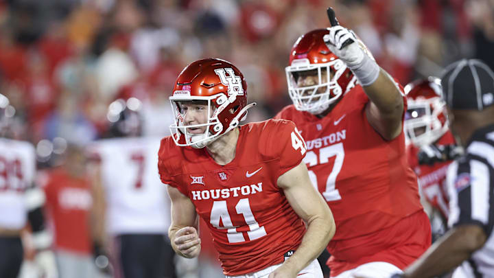 Oct 26, 2024; Houston, Texas, USA; Houston Cougars place kicker Jack Martin (41) reacts after kicking a field goal with time expiring in the fourth quarter to give the Cougars a win over Utah Utes at TDECU Stadium. Mandatory Credit: Troy Taormina-Imagn Images Oct 26, 2024; Houston, Texas, USA; Houston Cougars place kicker Jack Martin (41) reacts after kicking a field goal with time expiring in the fourth quarter to give the Cougars a win over Utah Utes at TDECU Stadium. Mandatory Credit: Troy Taormina-Imagn Images