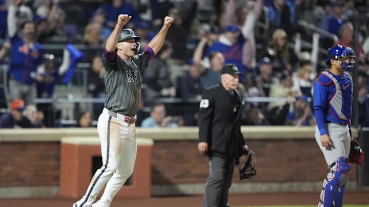 May 10, 2025; New York City, New York, USA; New York Mets first baseman Pete Alonso (20) reacts to New York Mets third baseman Brett Baty (7) (not pictured) three run home run against the Chicago Cubs during the fourth inning at Citi Field. Mandatory Credit: Gregory Fisher-Imagn Images