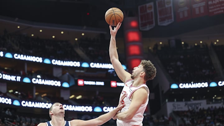 Nov 24, 2023; Houston, Texas, USA; Houston Rockets center Alperen Sengun (28) shoots the ball as Denver Nuggets center Nikola Jokic (15) defends during the first quarter at Toyota Center. Mandatory Credit: Troy Taormina-Imagn Images Nov 24, 2023; Houston, Texas, USA; Houston Rockets center Alperen Sengun (28) shoots the ball as Denver Nuggets center Nikola Jokic (15) defends during the first quarter at Toyota Center. Mandatory Credit: Troy Taormina-Imagn Images