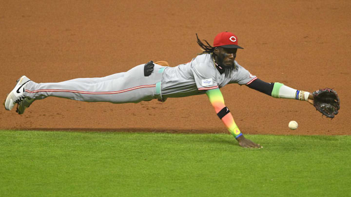Sep 24, 2024; Cleveland, Ohio, USA; Cincinnati Reds shortstop Elly De La Cruz (44) dives for the ball in the seventh inning against the Cleveland Guardians at Progressive Field. Mandatory Credit: David Richard-Imagn Images Sep 24, 2024; Cleveland, Ohio, USA; Cincinnati Reds shortstop Elly De La Cruz (44) dives for the ball in the seventh inning against the Cleveland Guardians at Progressive Field. Mandatory Credit: David Richard-Imagn Images