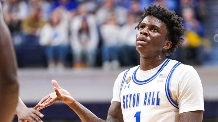 St. John's basketball transfer portal target Kadary Richmond (1) high-fives a teammate on Thursday, April 4, 2024,
