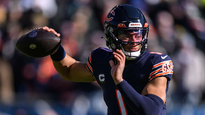 Dec 4, 2022; Chicago, Illinois, USA; Chicago Bears quarterback Justin Fields (1) passes the ball in