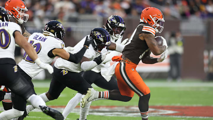 Nov 16, 2025; Cleveland, Ohio, USA; Cleveland Browns running back Quinshon Judkins (10) runs for a gain during the first quarter against the Baltimore Ravens at Huntington Bank Field. Mandatory Credit: Scott Galvin-Imagn Images