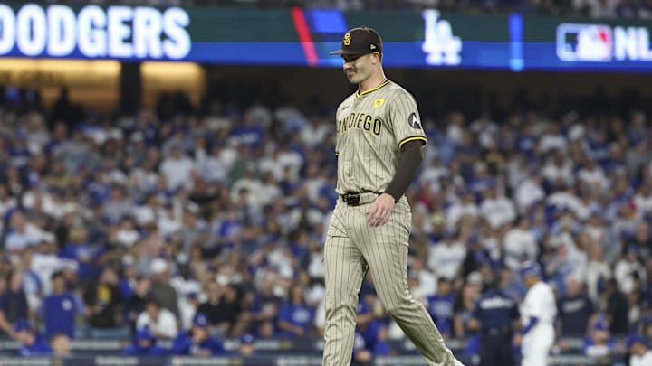 Oct 5, 2024; Los Angeles, California, USA; San Diego Padres pitcher Dylan Cease (84) leaves the field while playing the Los Angeles Dodgers during game one of the NLDS for the 2024 MLB Playoffs at Dodger Stadium. 