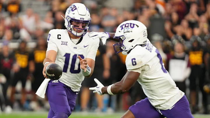 Sep 26, 2025; Tempe, Arizona, USA; TCU Horned Frogs quarterback Josh Hoover (10) fakes a handoff to running back Trent Battle (6) against Arizona State Sun Devils in the first half at Mountain America Stadium, Home of the ASU Sun Devils. Mandatory Credit: Jacob Reiner-Imagn Images