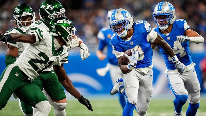 Detroit Lions running back Jahmyr Gibbs (0) runs against New York Jets cornerback Brandon Stephens (21) during the second half at Ford Field in Detroit on Sunday, Sept. 27, 2026. Detroit Lions running back Jahmyr Gibbs (0) runs against New York Jets cornerback Brandon Stephens (21) during the second half at Ford Field in Detroit on Sunday, Sept. 27, 2026.