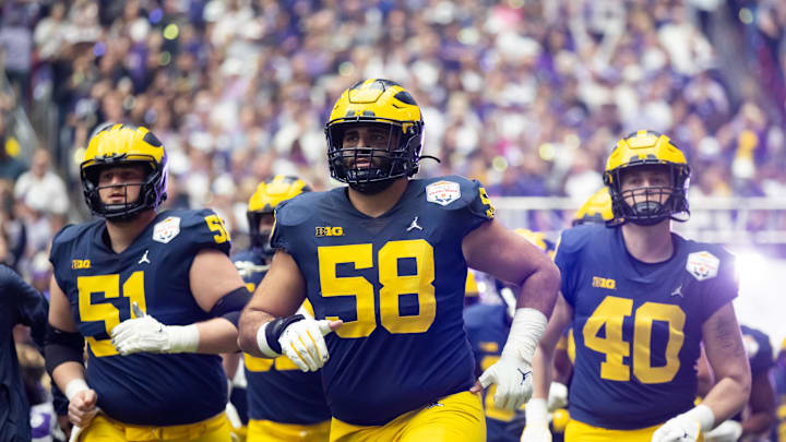 Dec 31, 2022; Glendale, Arizona, USA; Michigan Wolverines offensive lineman Giovanni El-Hadi (58) against the TCU Horned Frogs in the 2022 Fiesta Bowl at State Farm Stadium. Mandatory Credit: Mark J. Rebilas-USA TODAY Sports
