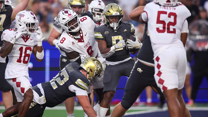 Sep 20, 2025; Atlanta, Georgia, USA; Georgia Tech Yellow Jackets running back Malachi Hosley (0) scores a touchdown against the Temple Owls in the third quarter at Bobby Dodd Stadium at Hyundai Field. Mandatory Credit: Brett Davis-Imagn Images
Sep 20, 2025; Atlanta, Georgia, USA; Georgia Tech Yellow Jackets running back Malachi Hosley (0) scores a touchdown against the Temple Owls in the third quarter at Bobby Dodd Stadium at Hyundai Field. Mandatory Credit: Brett Davis-Imagn Images