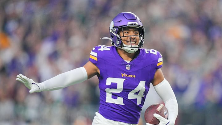 Dec 29, 2024; Minneapolis, Minnesota, USA; Minnesota Vikings safety Camryn Bynum (24) celebrates his fumble recovery against Green Bay Packers in the first quarter at U.S. Bank Stadium. Mandatory Credit: Brad Rempel-Imagn Images