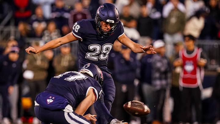 Nov 8, 2025; East Hartford, Connecticut, USA; UConn Huskies kicker Chris Freeman (28) kicks a field goal against the Duke Blue Devils in the second quarter at Pratt & Whitney Stadium at Rentschler Field. Mandatory Credit: David Butler II-Imagn Images Nov 8, 2025; East Hartford, Connecticut, USA; UConn Huskies kicker Chris Freeman (28) kicks a field goal against the Duke Blue Devils in the second quarter at Pratt & Whitney Stadium at Rentschler Field. Mandatory Credit: David Butler II-Imagn Images