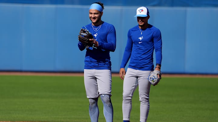 Feb 20, 2024; Dunedin, FL, USA;  Toronto Blue Jays shortstop Bo Bichette (11) smiles during a drill