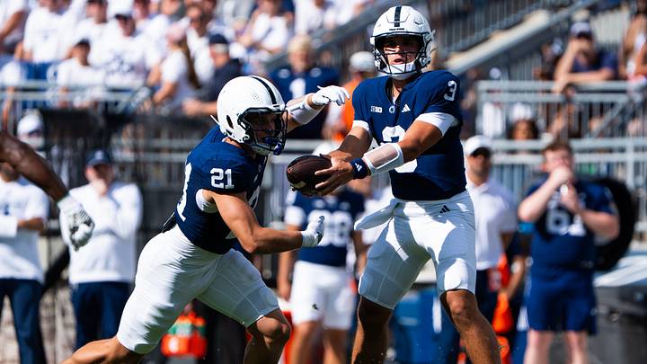 Penn State Nittany Lions quarterback Rocco Becht (3) hands off to running back Carson Hansen vs. Marshall at Beaver Stadium. Penn State Nittany Lions quarterback Rocco Becht (3) hands off to running back Carson Hansen vs. Marshall at Beaver Stadium.