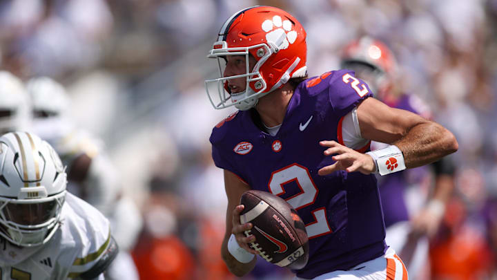 Sep 13, 2025; Atlanta, Georgia, USA; Clemson Tigers quarterback Cade Klubnik (2) scrambles against the Georgia Tech Yellow Jackets in the second quarter at Bobby Dodd Stadium at Hyundai Field. Mandatory Credit: Brett Davis-Imagn Images