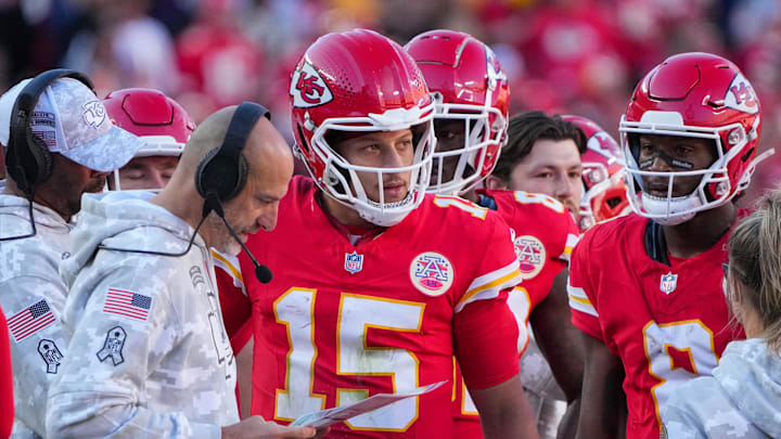 Nov 10, 2024; Kansas City, Missouri, USA; Kansas City Chiefs quarterback Patrick Mahomes (15) talks with offensive coordinator Matt Nagy against the Denver Broncos during the game at GEHA Field at Arrowhead Stadium. Mandatory Credit: Denny Medley-Imagn Images