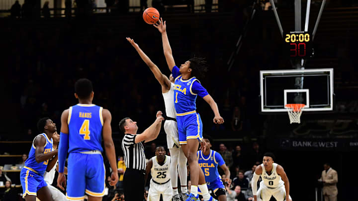 Mar 7, 2019; Boulder, CO, USA;UCLA Bruins center Moses Brown (1) and Colorado Buffaloes guard Tyler Bey (1) start the game in the first half at the CU Events Center. Mandatory Credit: Ron Chenoy-Imagn Images Mar 7, 2019; Boulder, CO, USA;UCLA Bruins center Moses Brown (1) and Colorado Buffaloes guard Tyler Bey (1) start the game in the first half at the CU Events Center. Mandatory Credit: Ron Chenoy-Imagn Images