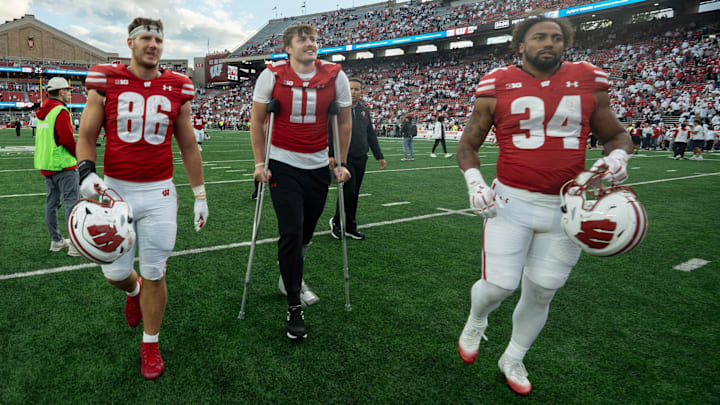 Wisconsin Badgers tight ends Lance Mason (86), Tucker Ashcraft and Jackson Acker (34) leave the field after their game Saturday, September 6, 2025 at Camp Randall Stadium in Madison, Wisconsin. Wisconsin beat Middle Tennessee 42-10.