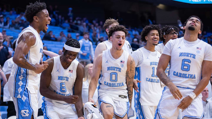 Dec 16, 2025; Chapel Hill, North Carolina, USA; North Carolina Tar Heels forward Caleb Wilson (8) and guard Kyan Evans (0) react after a missed shot during the second half against the ETSU Buccaneers at Dean E. Smith Center. Mandatory Credit: Scott Kinser-Imagn Images