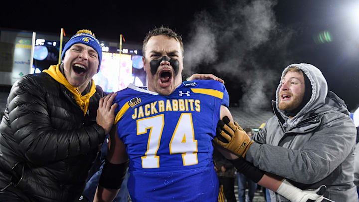 South Dakota State’s Garret Greenfield yells in celebration with friends.