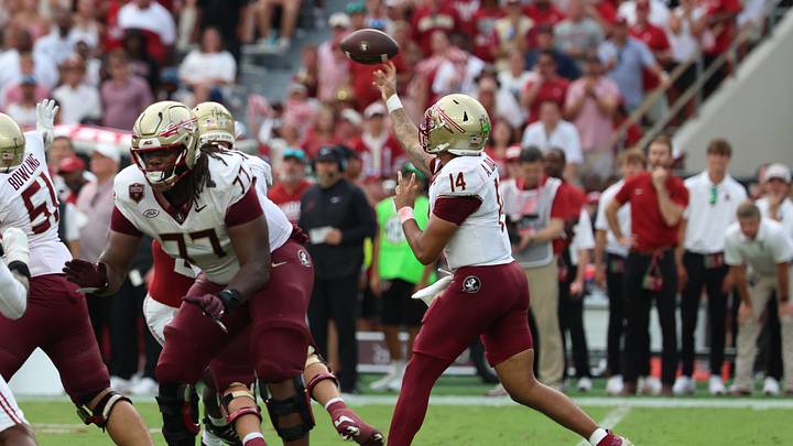 Sep 19, 2026; Tuscaloosa, Alabama, USA;  Florida State Seminoles quarterback Ashton Daniels (14) passes against the Alabama Crimson Tide during the first half at Saban Field at Bryant-Denny Stadium.  Mandatory Credit: David Leong-Imagn Images