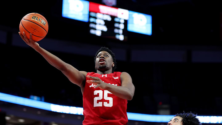 Feb 17, 2026; Columbus, Ohio, USA; Wisconsin Badgers guard John Blackwell (25) drives to the basket as Ohio State Buckeyes guard Taison Chatman (3) defends during the first half at Value City Arena.