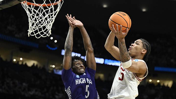 Mar 21, 2026; Portland, OR, USA; Arkansas Razorbacks guard Darius Acuff Jr. (5) shoots against High Point Panthers forward Terry Anderson (5) in the second half during a second round game of the men's 2026 NCAA Tournament at Moda Center. Mandatory Credit: Troy Wayrynen-Imagn Images Mar 21, 2026; Portland, OR, USA; Arkansas Razorbacks guard Darius Acuff Jr. (5) shoots against High Point Panthers forward Terry Anderson (5) in the second half during a second round game of the men's 2026 NCAA Tournament at Moda Center. Mandatory Credit: Troy Wayrynen-Imagn Images