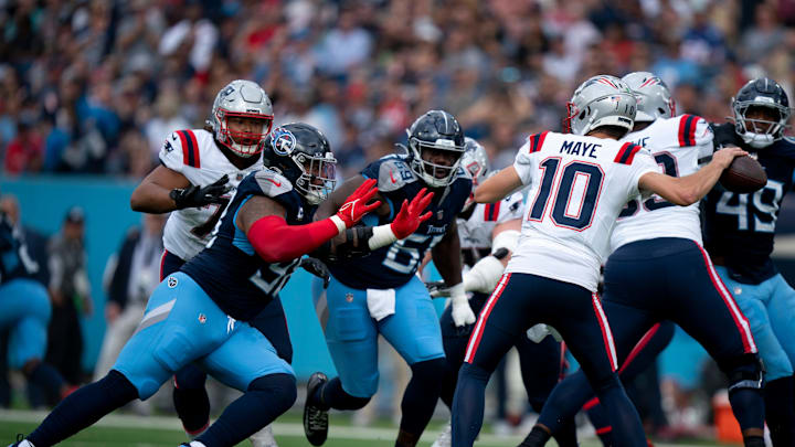 New England Patriots quarterback Drake Maye (10) is pressured by Tennessee Titans defensive tackle Jeffery Simmons (98) and defensive tackle Sebastian Joseph-Day (69) during their game at Nissan Stadium in Nashville, Tenn., Sunday, Nov. 3, 2024.