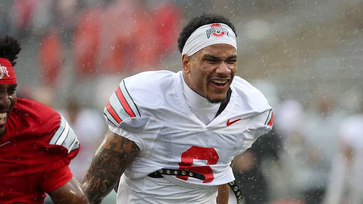Apr 18, 2026; Columbus, OH, USA; Ohio State cornerback Devin Sanchez (6) sprints out of the rain storms following the second half as part of the annual spring game at Ohio Stadium. Mandatory Credit: Joseph Maiorana-Imagn Images Apr 18, 2026; Columbus, OH, USA; Ohio State cornerback Devin Sanchez (6) sprints out of the rain storms following the second half as part of the annual spring game at Ohio Stadium. Mandatory Credit: Joseph Maiorana-Imagn Images