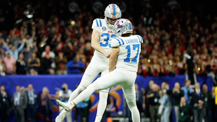 Jan 1, 2026; New Orleans, LA, USA; Ole Miss Rebels place kicker Lucas Carneiro (17) celebrates with Ole Miss Rebels punter Oscar Bird (33) after kicking the game winning field goal against the Georgia Bulldogs in the second half during the 2025 Sugar Bowl and quarterfinal game of the College Football Playoff at Caesars Superdome. Mandatory Credit: Amber Searls-Imagn Images Jan 1, 2026; New Orleans, LA, USA; Ole Miss Rebels place kicker Lucas Carneiro (17) celebrates with Ole Miss Rebels punter Oscar Bird (33) after kicking the game winning field goal against the Georgia Bulldogs in the second half during the 2025 Sugar Bowl and quarterfinal game of the College Football Playoff at Caesars Superdome. Mandatory Credit: Amber Searls-Imagn Images